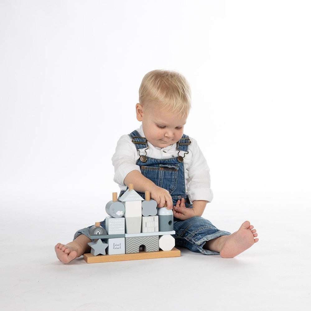 Child playing with Label Label blue wooden block house toy set