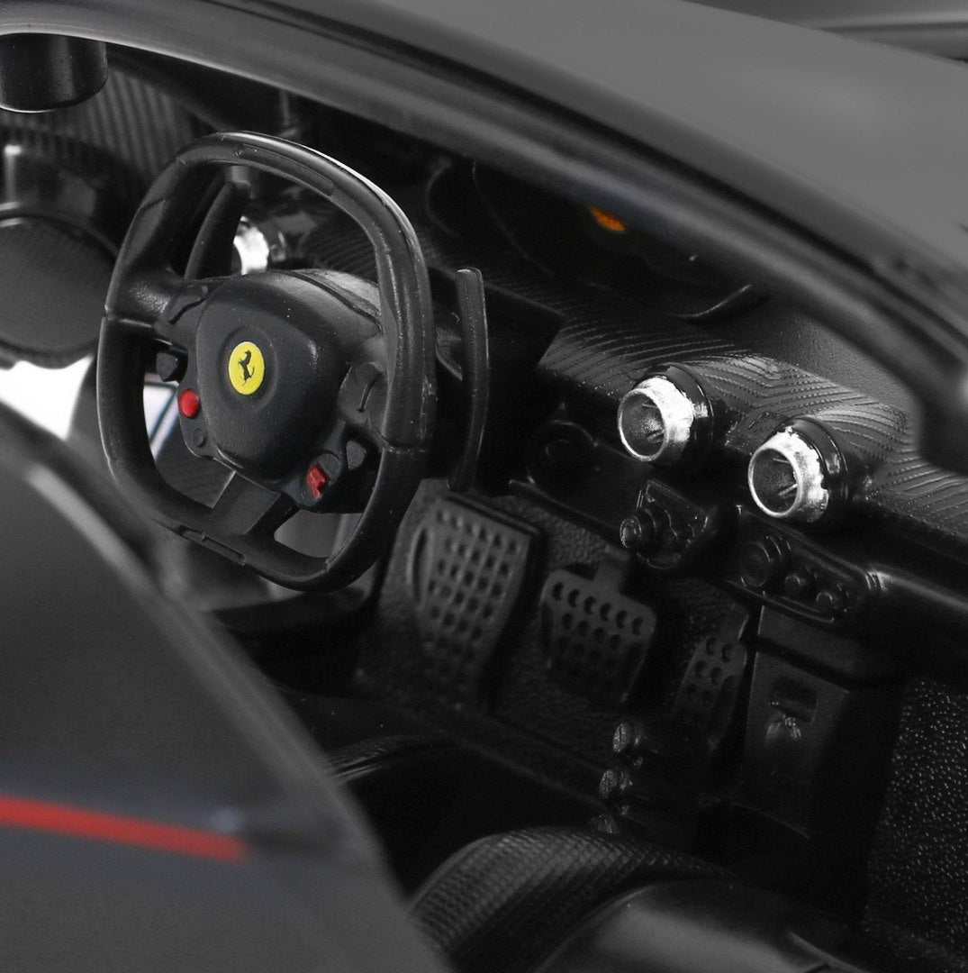 Interior detail of black Ferrari LaFerrari Aperta remote control model by RASTAR scale 1:14