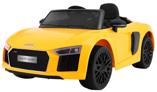 Yellow Audi R8 Spyder electric ride-on car for kids with LED lights and MP3 player