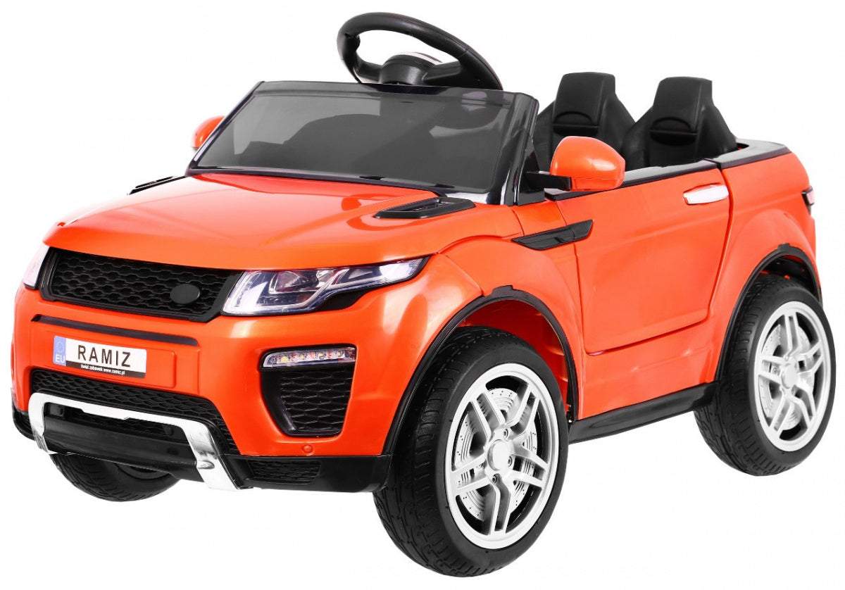 Pomarańczowe autko Rapid Racer elektryczny SUV dla dzieci z pilotem, światłami LED i dźwiękami, na akumulator 12V.