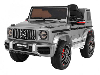 Mercedes AMG G63 electric ride-on toy car for kids in silver with remote control, LED lights, MP3 player, and eco-leather seat