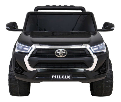 Czarny Toyota Hilux na akumulator dla dzieci z napędem 4x4 i pilotem zdalnego sterowania