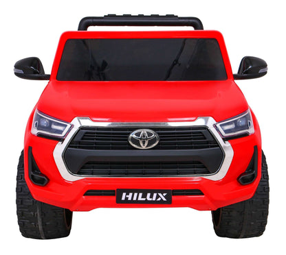 Czerwony dziecięcy Toyota Hilux na akumulator z napędem 4x4 i pilotem zdalnego sterowania