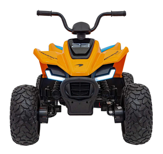 Front view of orange Quad McLaren Racing MCL 35 kids electric quad with LED lights and rugged EVA wheels