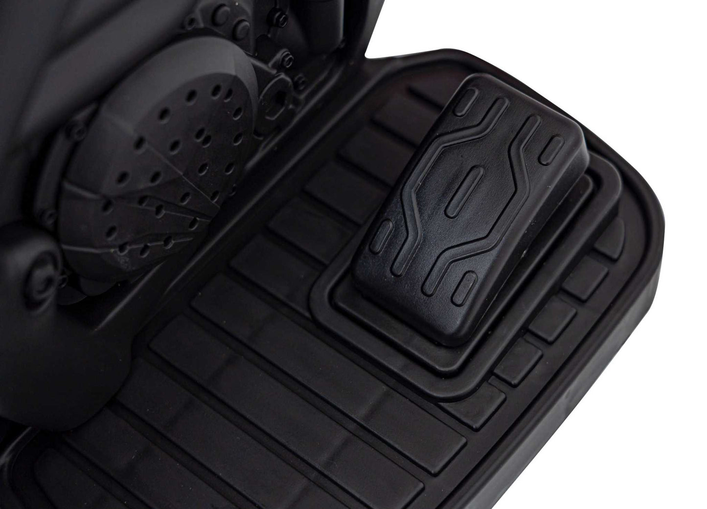 Close-up of black foot pedal on Motorek Cross Honda CRF 450R electric toy bike for kids