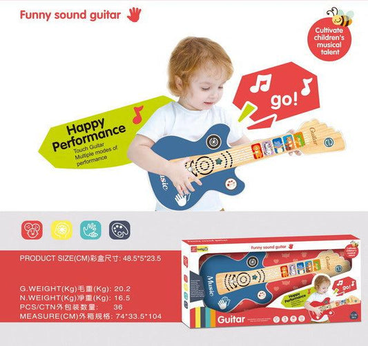 Dziecko grające na kolorowej gitarze dla najmłodszych z funkcją świateł i dźwięków od Minika, zabawka edukacyjna rozwijająca muzyczne zdolności.