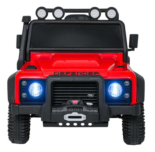 Red Land Rover Defender 110 SVX electric kids ride-on car with LED headlights and off-road design