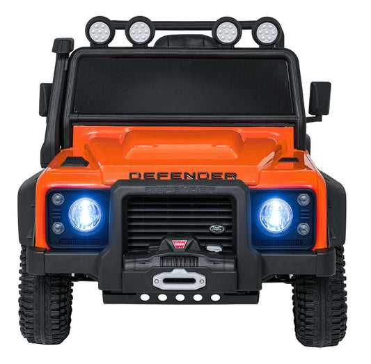 Orange Land Rover Defender 110 SVX kids electric ride-on car with LED headlights and off-road design