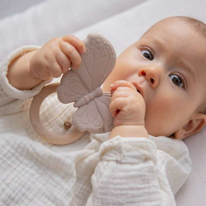 Baby holding Label Label silikonowy butterfly-shaped silicone and FSC certified wood teether